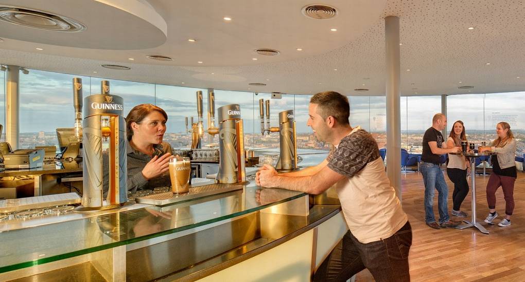 Stag enjoys a pint in the stunning Gravity Bar on the Guinness Tour