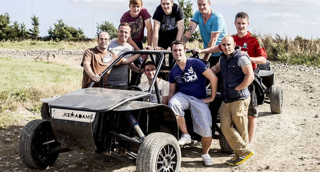 Group of lads pose with a Rage Buggy