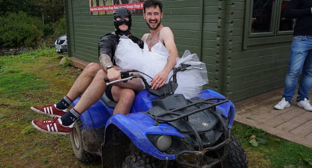 Stag poses on a quad bike in fancy dress