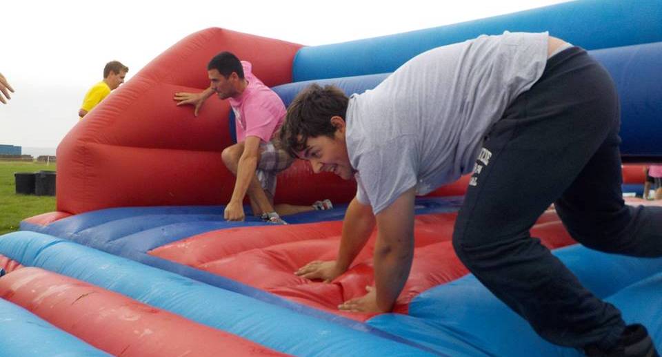 Stags compete to win the Inflatable Games event