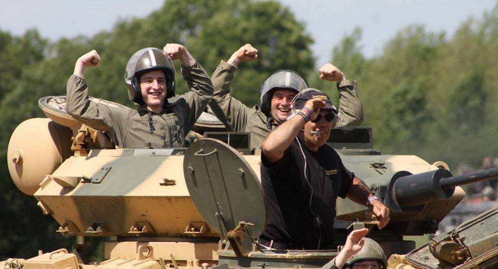 Stag do enjoying a tank ride